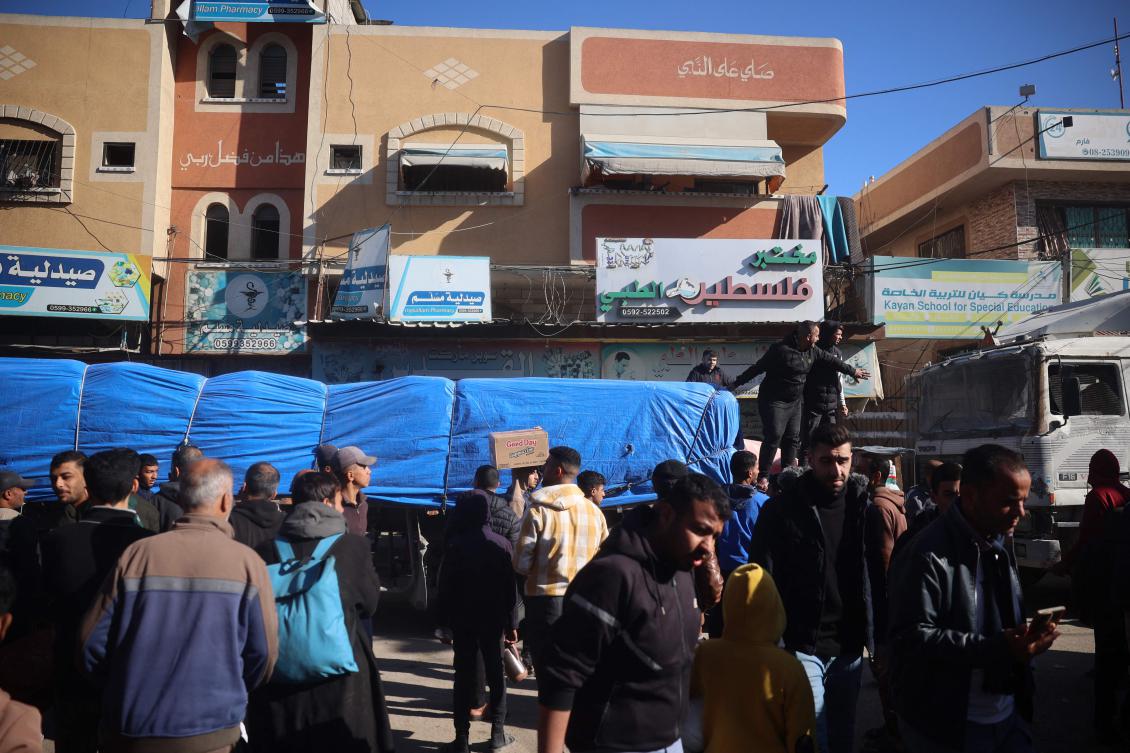 A truck transporting humanitarian aid drives in Deir el-Balah on December 29, 2024. (AFP)