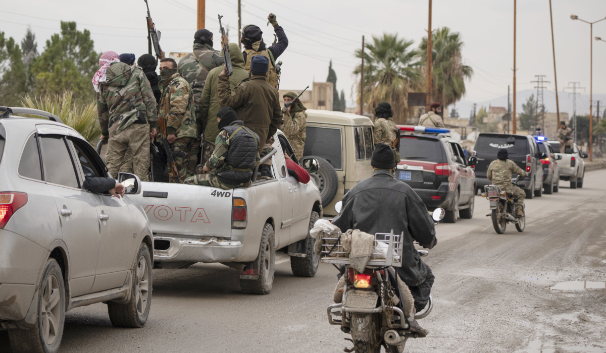 Members of the security forces of the newly formed Syrian government take part in an operation as they detain, what they say militias of the ousted president Bashar Assad in Adra, on the outskirts of Damascus, Syria, Monday, Dec. 30, 2024. (AP)