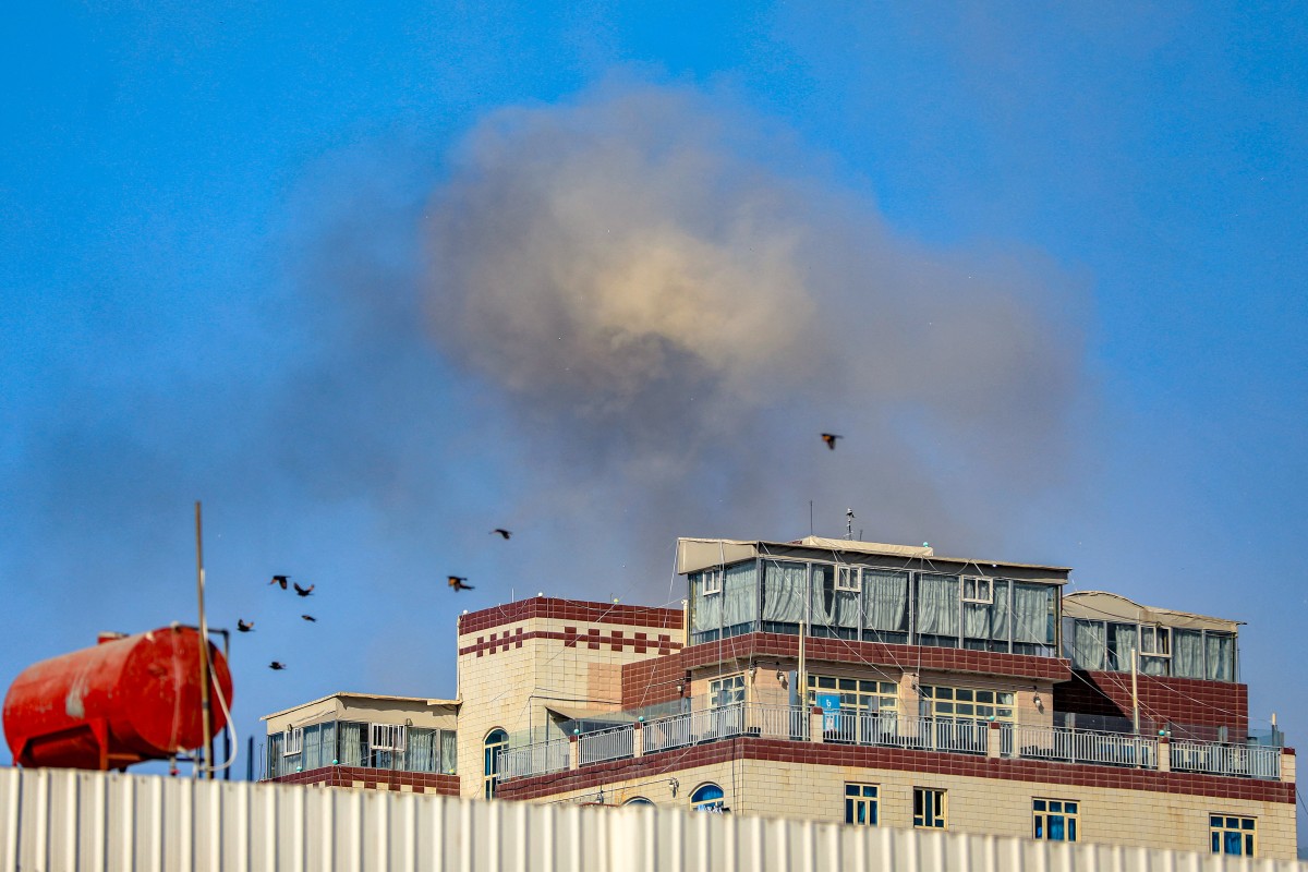A smoke cloud billows after an air strike on Yemen's Houthi-held capital Sanaa on December 31, 2024. (AFP)