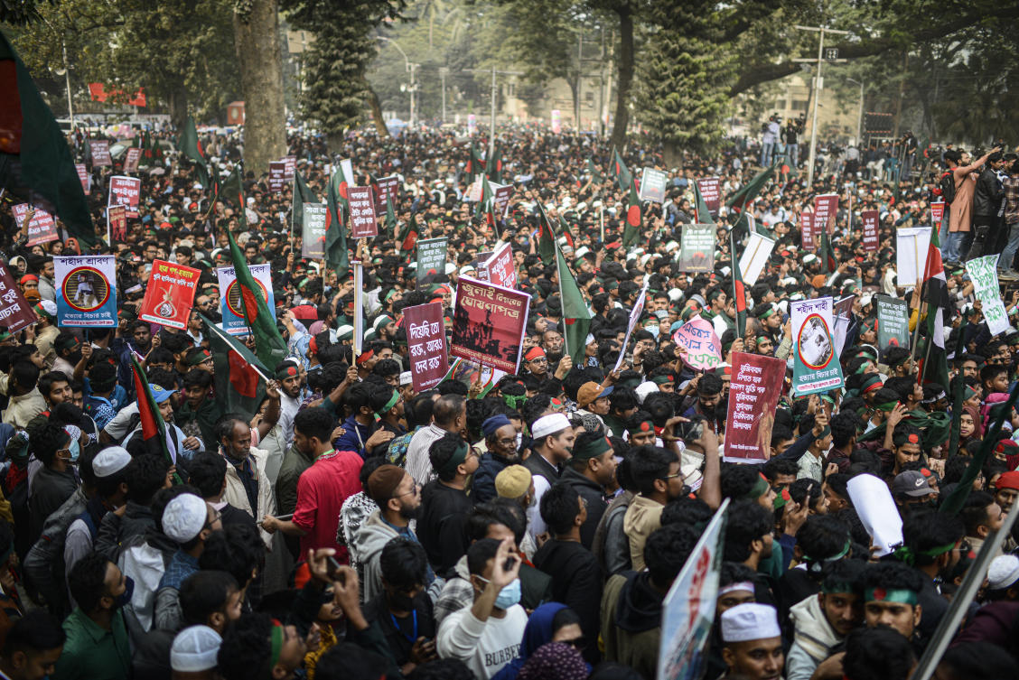 Students carry placards and shout slogans during “March for Unity” organized by The Anti-Discrimination Student Movement at the Central Shaheed Minar, a national monument, in Dhaka, Bangladesh, Tuesday, Dec. 31, 2024. (AP)