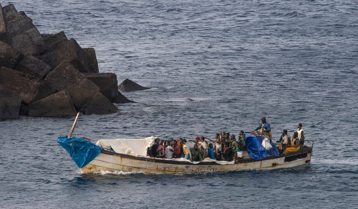 A 'cayuco' boat with 57 migrants onboard arrives at La Restinga port on the Canary island of El Hierro, on September 14, 2024. (AFP)