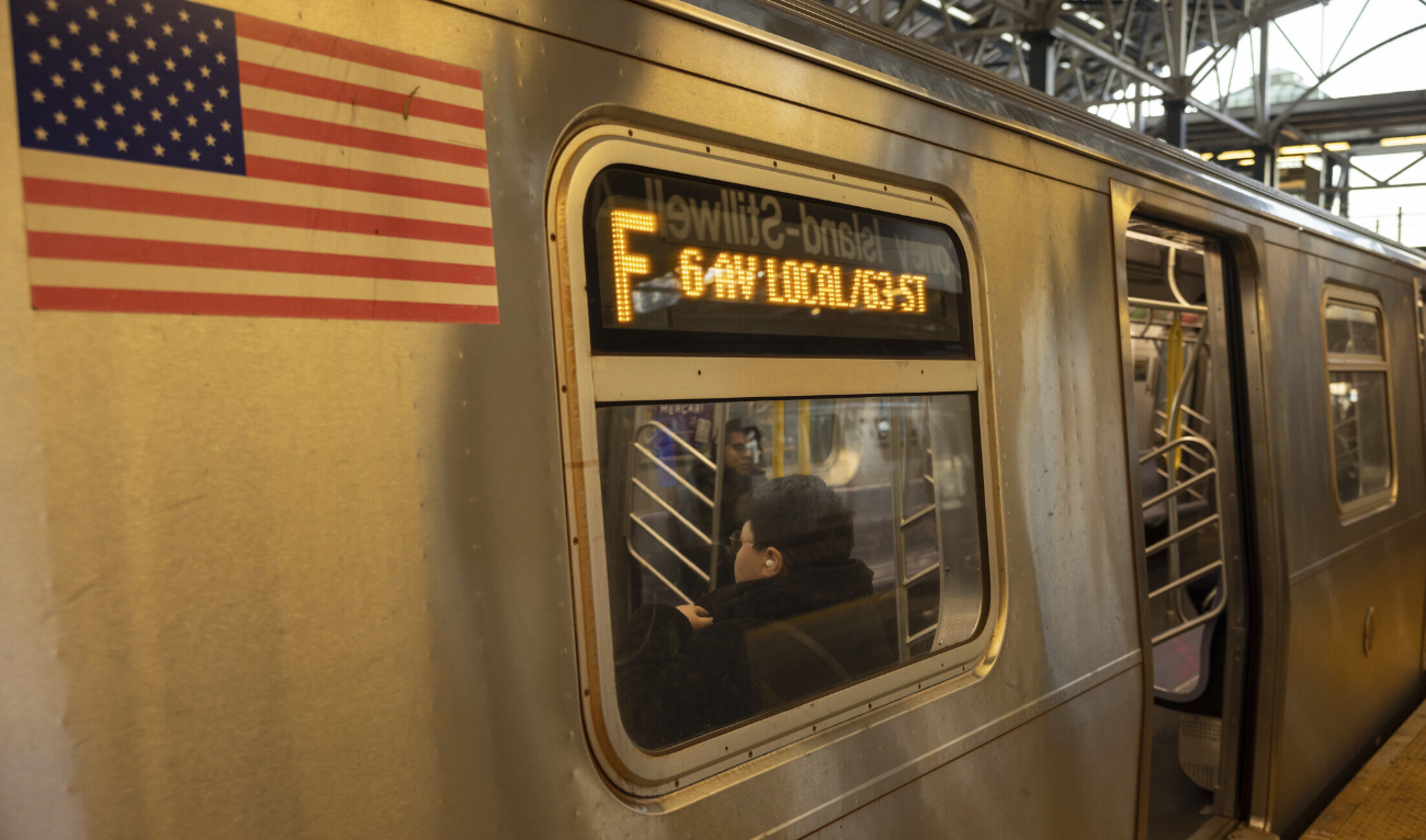 Commuters sit on the F train at the Coney Island-Stillwell Avenue Station, Thursday, Dec. 26, 2024, in New York. (AP)