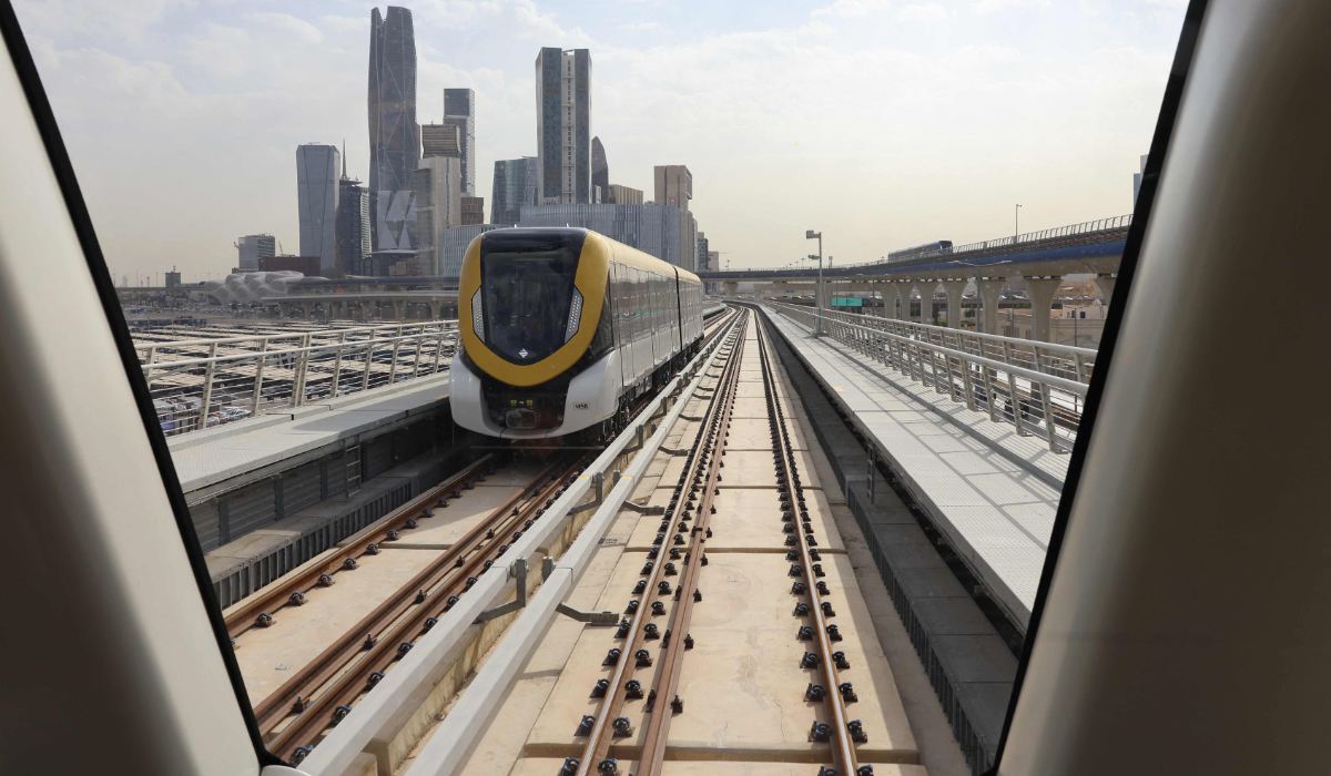 A train travels to the King Abdullah Finance District "KAFD" metro station in the Saudi capital Riyadh on Dec. 1, 2024. (AFP)