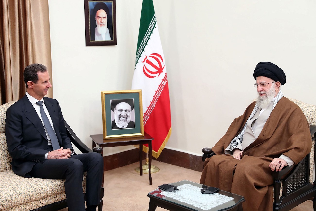 Iran’s Supreme Leader Ayatollah Ali Khamenei meets with Syria’s President Bashar Al-Assad in Tehran. (File/AFP)