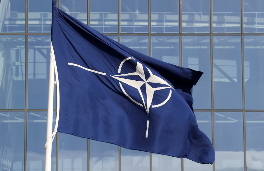 A NATO flag is seen at the Alliance headquarters ahead of a NATO Defense Ministers meeting, in Brussels, Belgium. (Reuters)