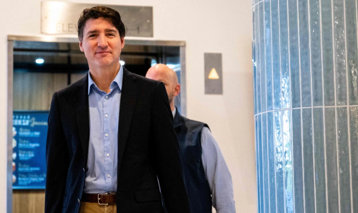 Canadian Prime Minister Justin Trudeau exits the Delta Hotels by Marriott West Palm Beach on November 30, 2024 in Palm Beach, Florida. (AFP)