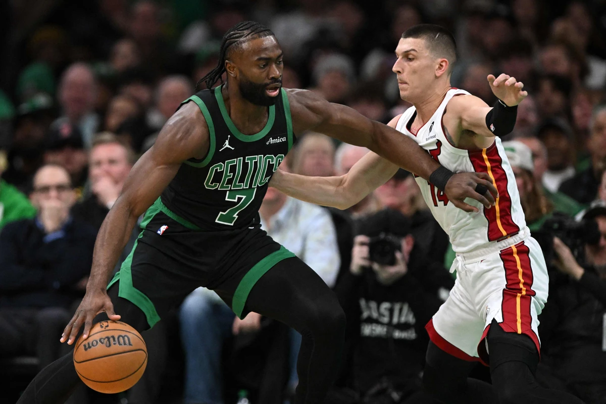 Jaylen Brown of the Boston Celtics dribbles the ball to the basket against Tyler Herro of the Miami Heat during the first quarter of an NBA game at the TD Garden on Dec. 02, 2024 in Boston, Massachusetts. (Getty Images via AFP)