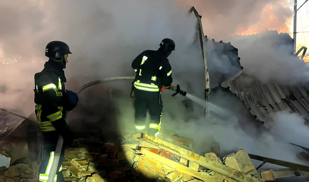 In this handout photograph taken and released by the Ukrainian Emergency Service on November 28, 2024, Ukrainian rescuers work to extinguish a fire at an energy infrastructure facility following a missile attack in Lutsk, Volyn region. (AFP/File)
