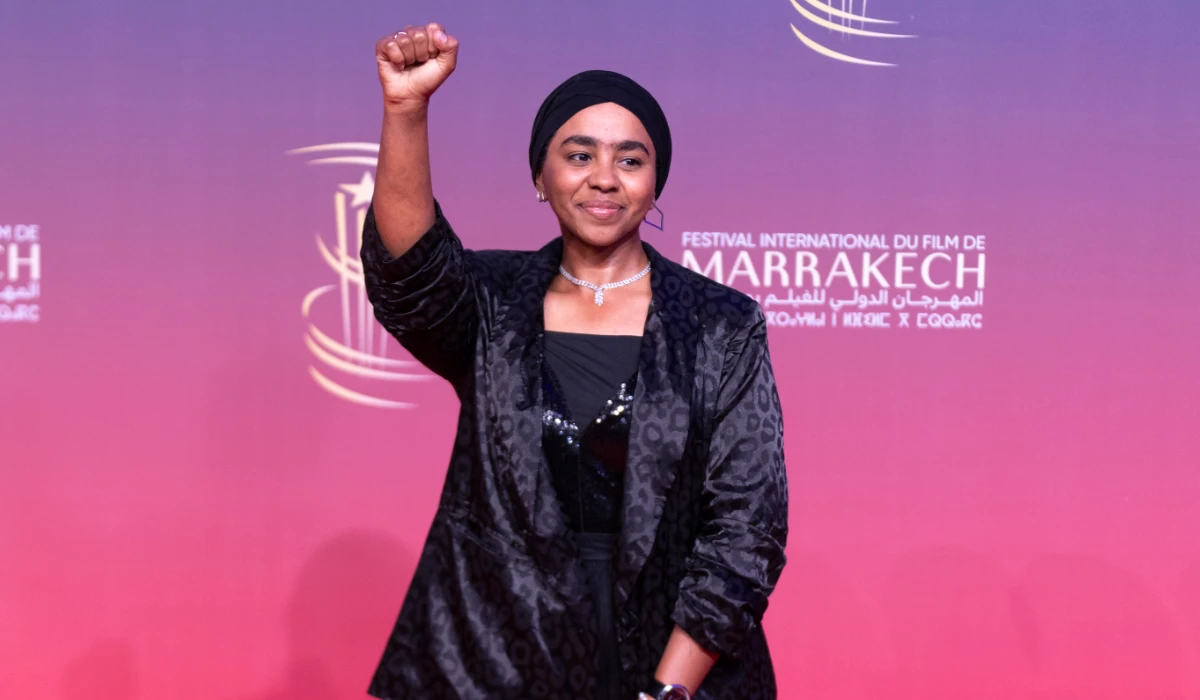 Sudanese activist, Shajan Suliman, gestures while attending the screening of Sudan Remember Us movie, during the Marrakech International Film Festival, in Morocco, Monday, Dec. 2, 2024. (AP)