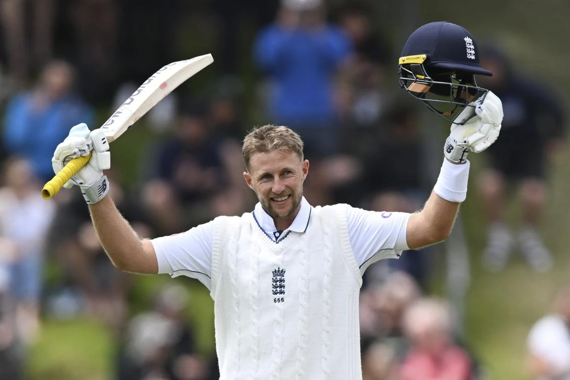 England's Joe Root reacts after scoring a century during play on day three of the second cricket test between New Zealand and England at the Basin Reserve in Wellington, New Zealand, Sunday, Dec.8, 2024. (Andrew Cornaga/Photosport via AP)