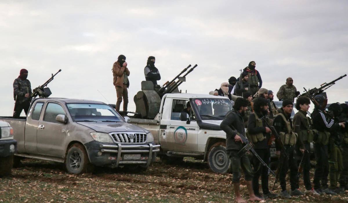 Turkish-backed Syrian fighters gather with their vehicles at a position near the northern Syrian town of Manbij. (AFP file photo)