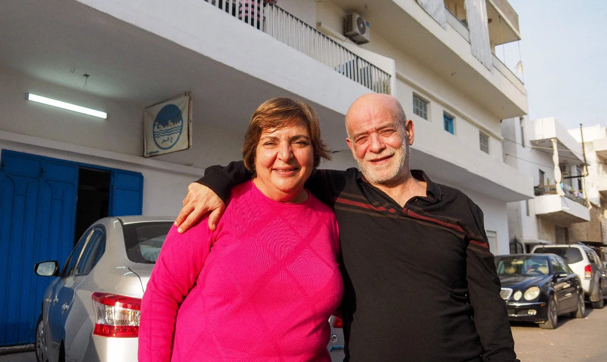 Suhail Al-Hamwi (61) poses for a picture with his wife Josephine in the coastal town of Chekka in northern Lebanon on December 9, 2024, after spending 33 years in a Syrian prison, following the ousting of Syria's President Bashar Al-Assad a day earlier. (AFP)