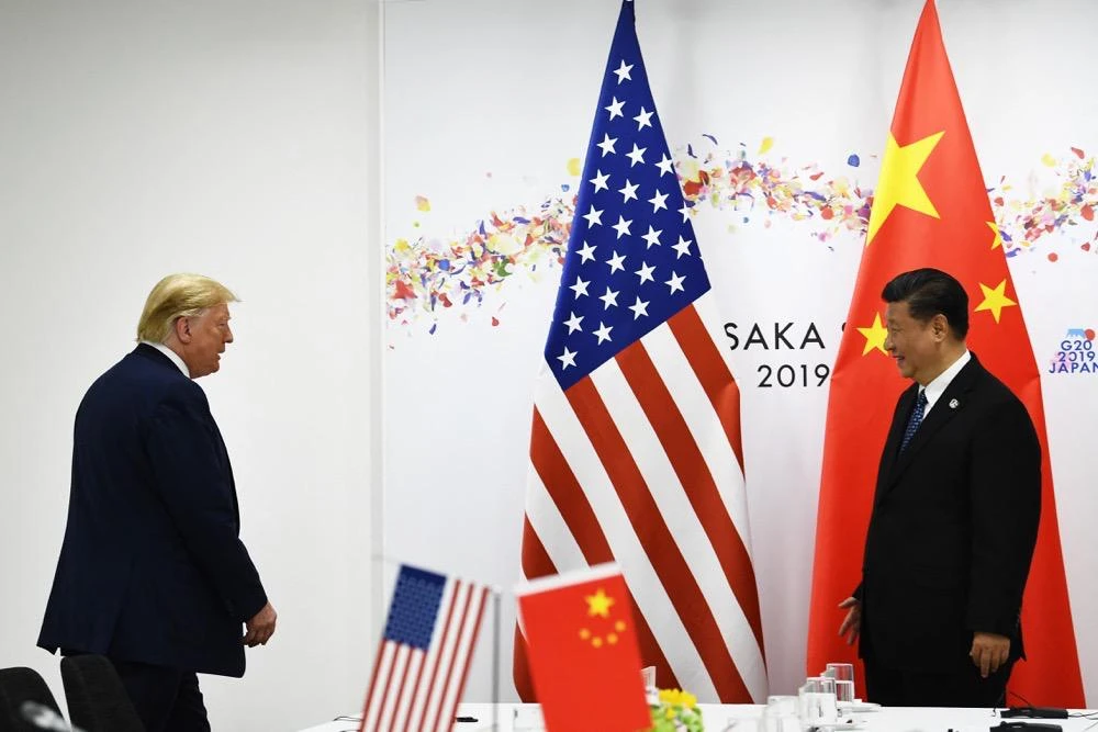 Chinese President Xi Jinping and US President Donald Trump in Osaka in 2019. (AFP/File)