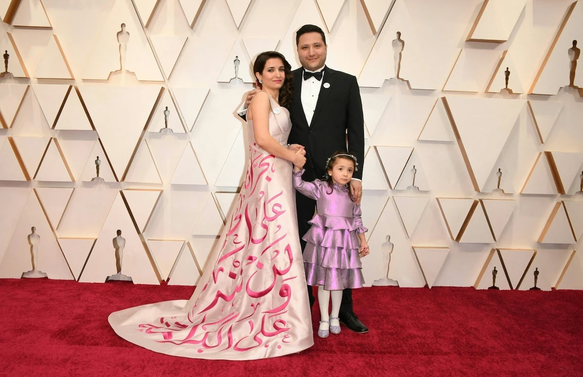 Syrian filmmaker Waad Al-Kateab with her husband Hamza Al-Kateab and daughter Sama Al-Kateab at the 92nd Oscars in 2020. (AFP)