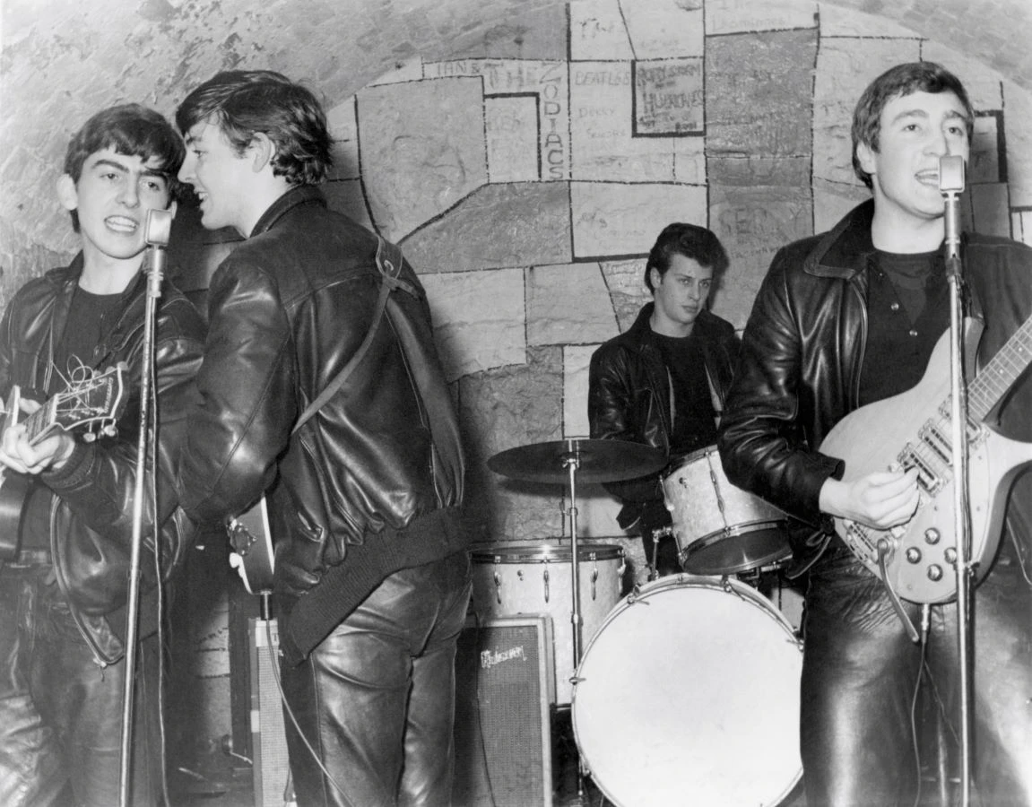 The Beatles (with original drummer Pete Best) at the Cavern Club in Liverpool in 1961. (Getty Images)