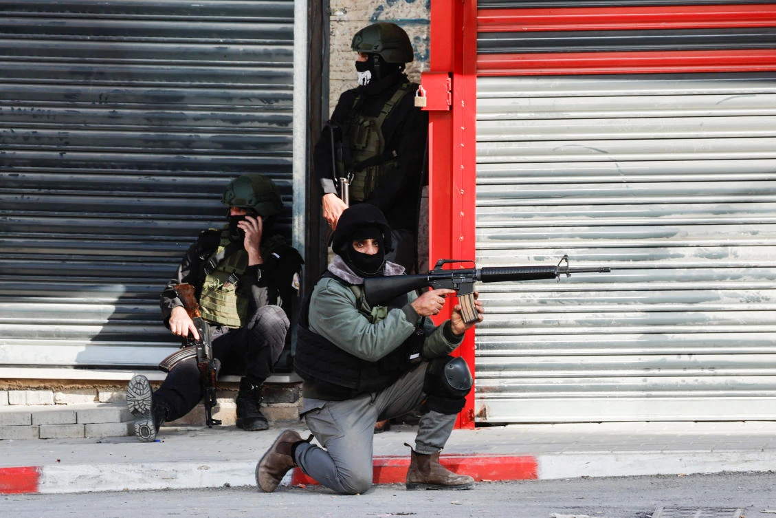 The Palestinian Authority’s security branch said in a statement that its forces were undertaking a security operation to restore law and order to Jenin’s historic refugee camp suburb. (Reuters)