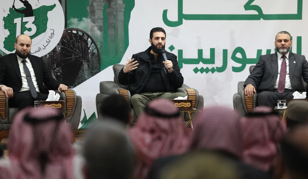 Ahmad Al-Sharaa, center, better known as Abu Mohammed Al-Golani, said he was not interested in engaging in new conflicts. (AFP file photo)