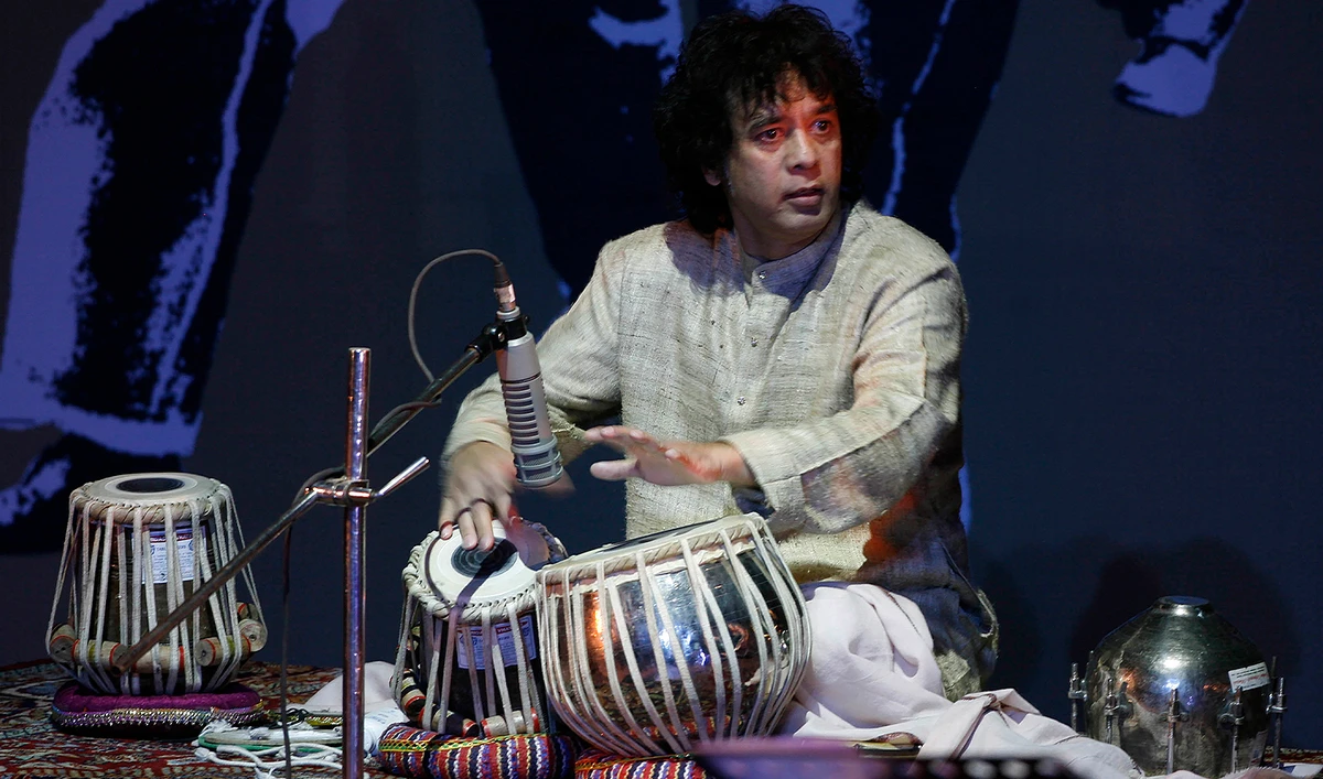 Indian drum maestro Zakir Hussain performs at the "Living Dream Concert" in New Delhi, India, on Feb. 16, 2009. (AP/File)