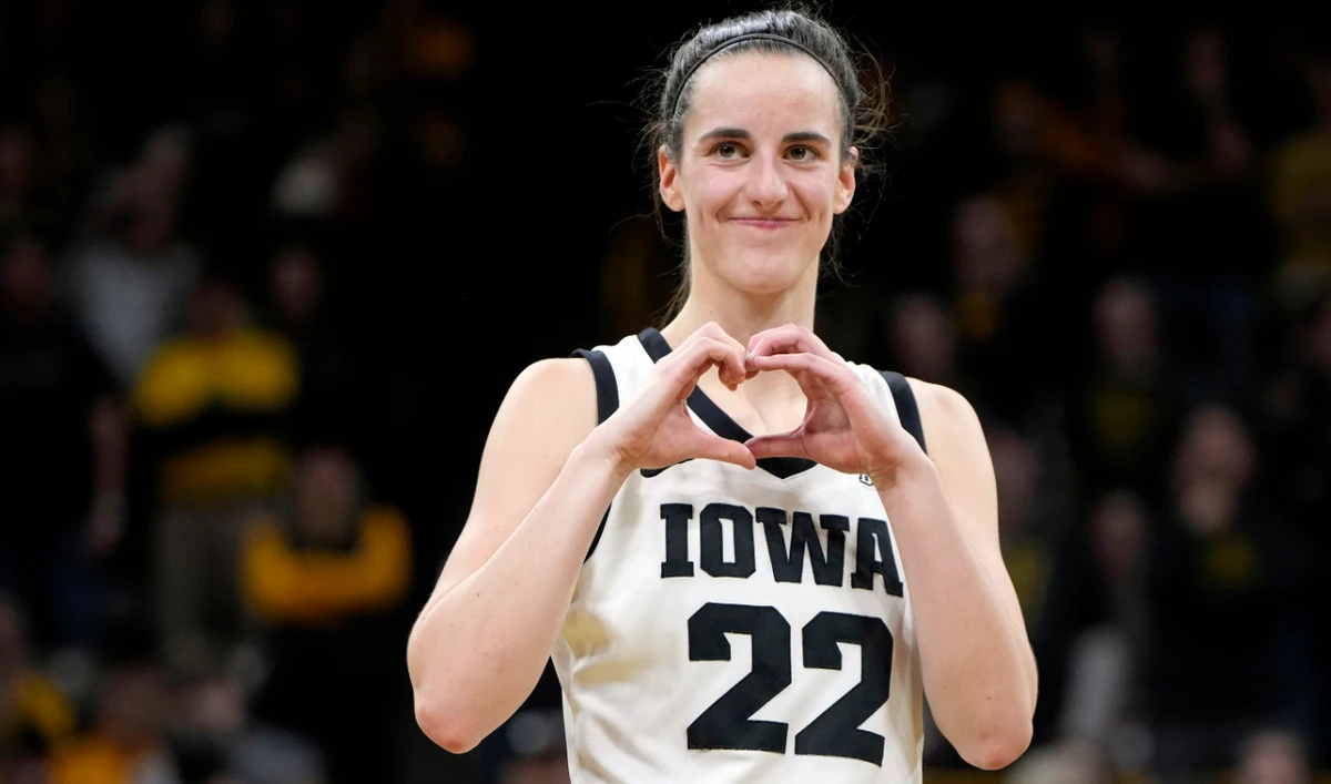 Iowa guard Caitlin Clark makes a heart gesture after the team's NCAA college basketball game against Michigan, on Feb. 15, 2024, in Iowa City, Iowa. Clark broke the NCAA women's career scoring record. (File/AP)