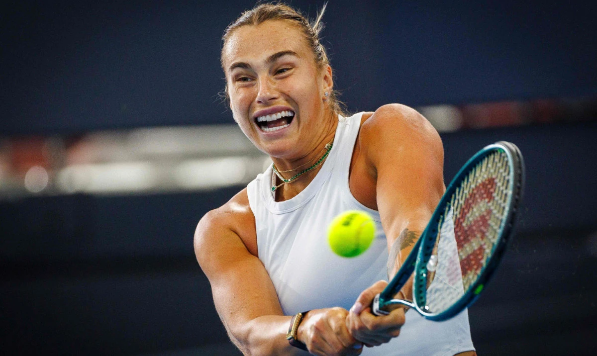 Belarus’ Aryna Sabalenka during training in preparation for the Brisbane International tennis tournament at the Patrick Rafter Tennis Center in Brisbane on Dec. 24, 2024. (AFP)