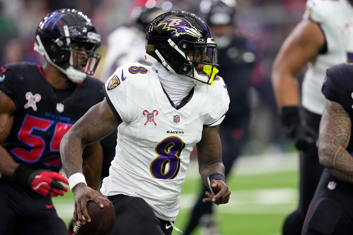 Baltimore Ravens quarterback Lamar Jackson (8) runs up field during the first half of an NFL football game against the Houston Texans, Wednesday, Dec. 25, 2024, in Houston. (AP)