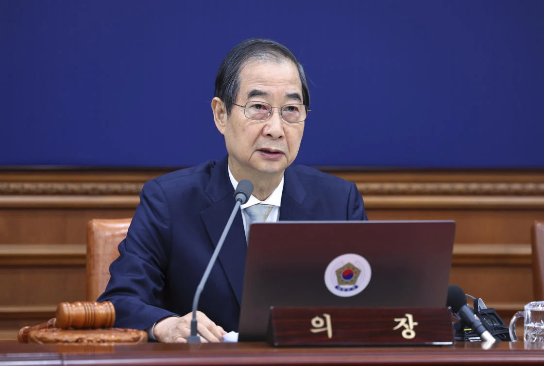 South Korea’s Prime Minister Han Duck-soo, the country’s acting leader after President Yoon Suk Yeol’s impeachment, said that he will not appoint the justices until political parties reach agreement on the appointments. (Yonhap via AP)