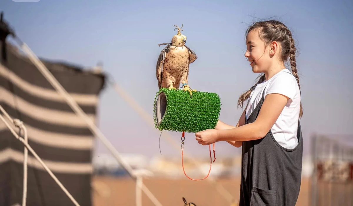 The falconer supervising the pavilion said that raising falcons is a proud legacy passed down through the generations. (SPA)