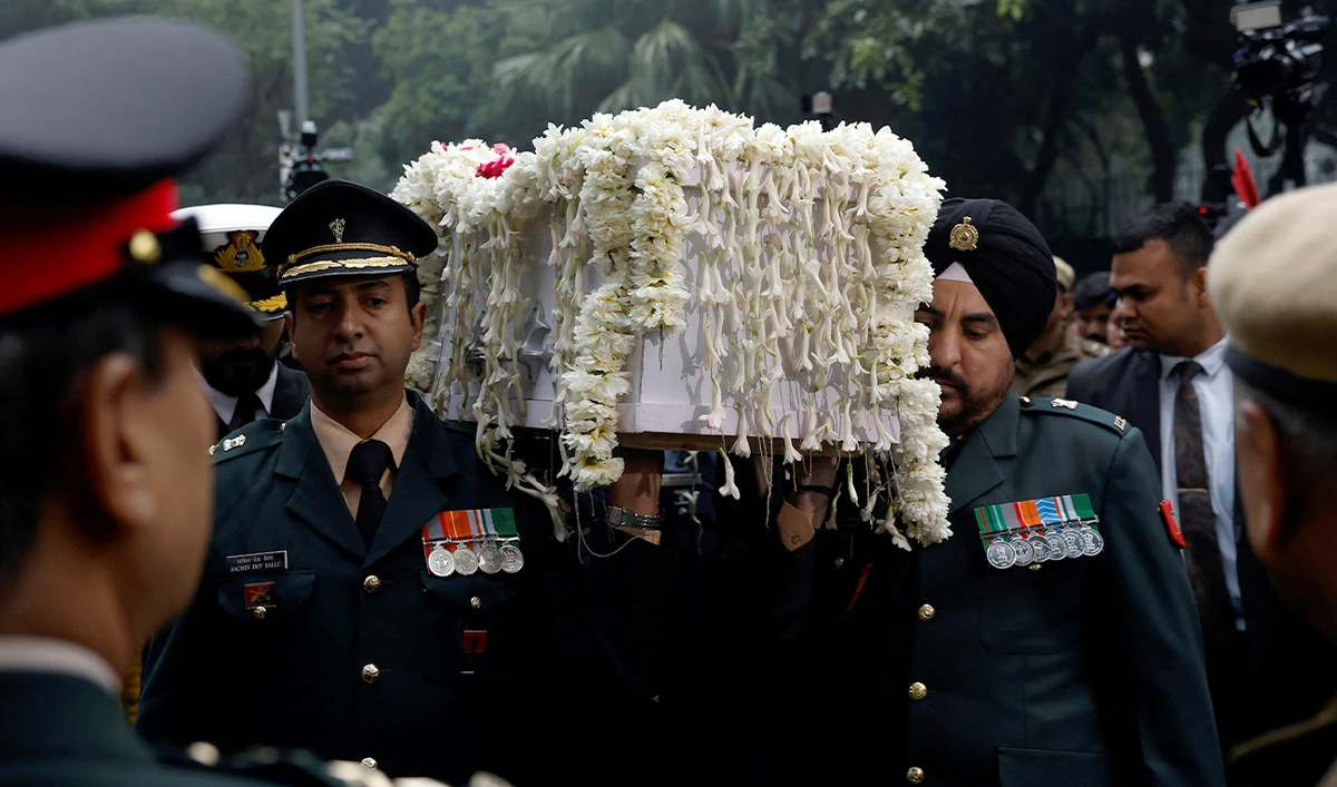 Military officers carry the coffin with the mortal remains of India’s former Prime Minister Manmohan Singh at the Congress party’s headquarters in New Delhi, India, on December 28, 2024. (REUTERS)