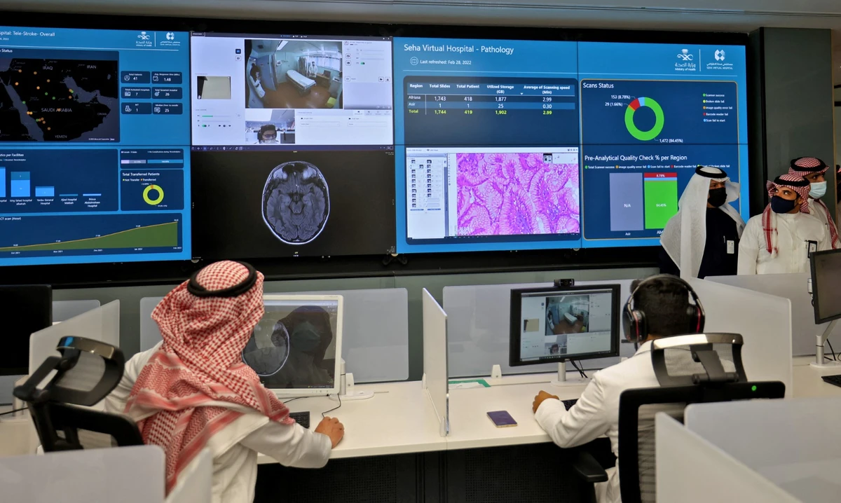 File photo of Saudi health staff work at the newly-inaugurated Seha Virtual Hospital, which uses telemedicine and offers real-time consultations with doctors via video calling, in the Digital City of the Saudi capital Riaydh (AFP)