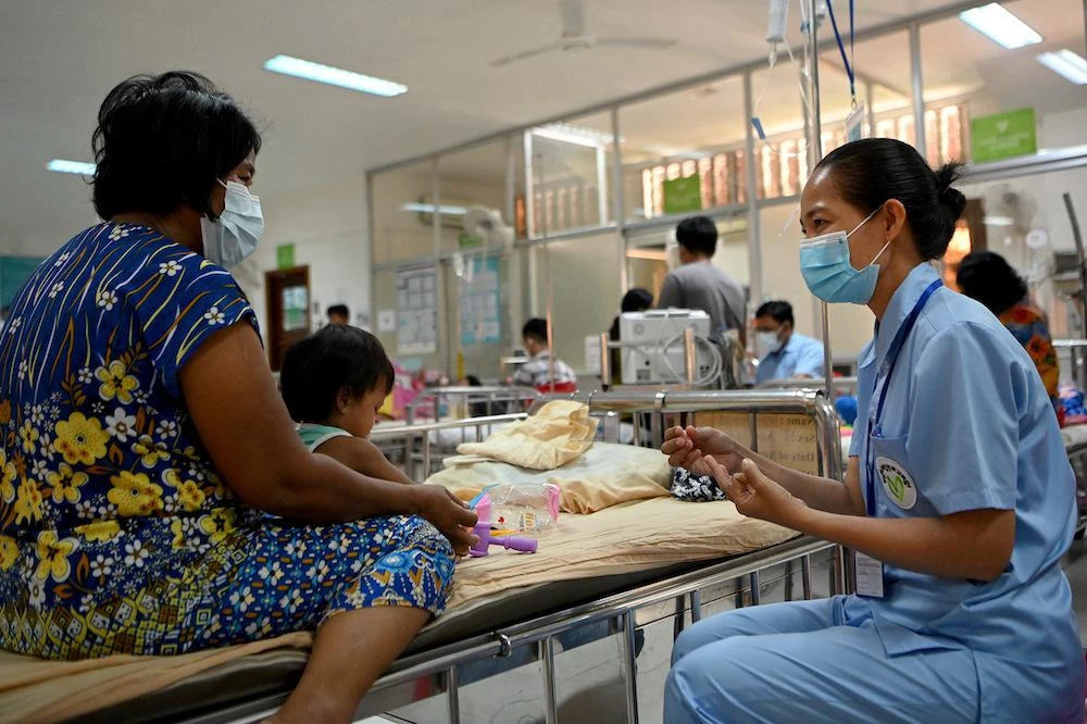 Couples – mostly from China – are willing to pay between $40,000 to $100,000 to surrogacy agents to find a Cambodian woman who can carry their child. (AFP file photo)