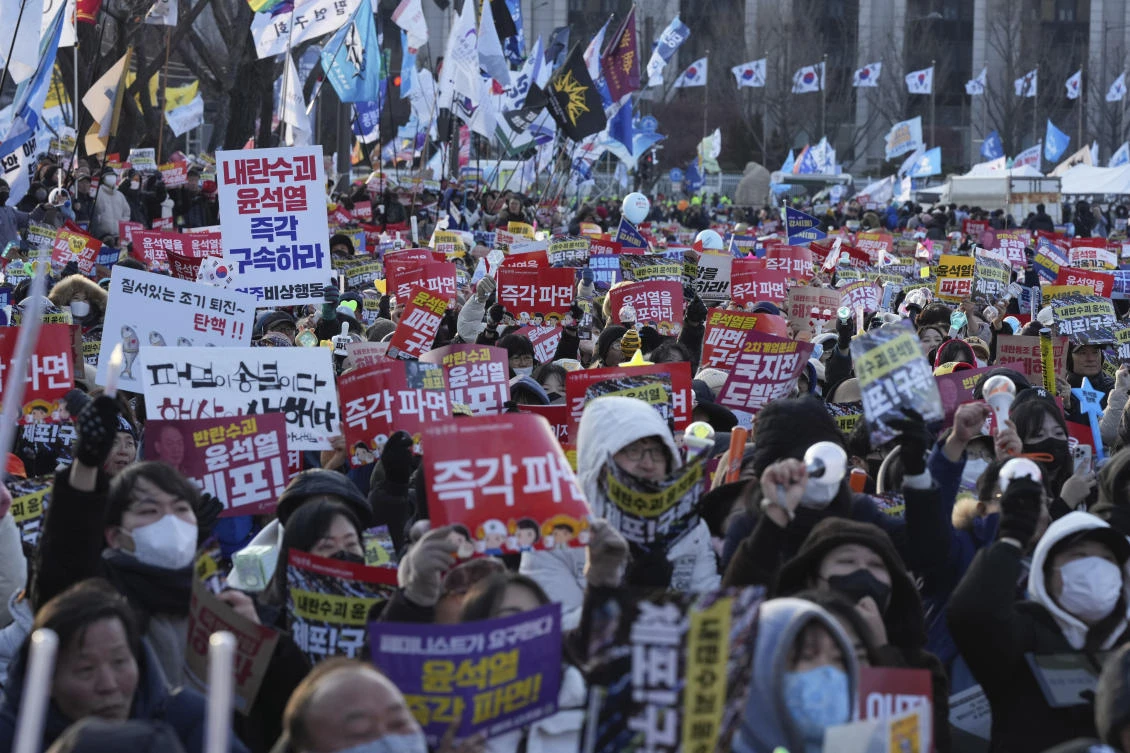 Protesters demand South Korea’s impeached President Yoon Suk Yeol to resign in downtown Seoul on Dec. 28, 2024. (AP)