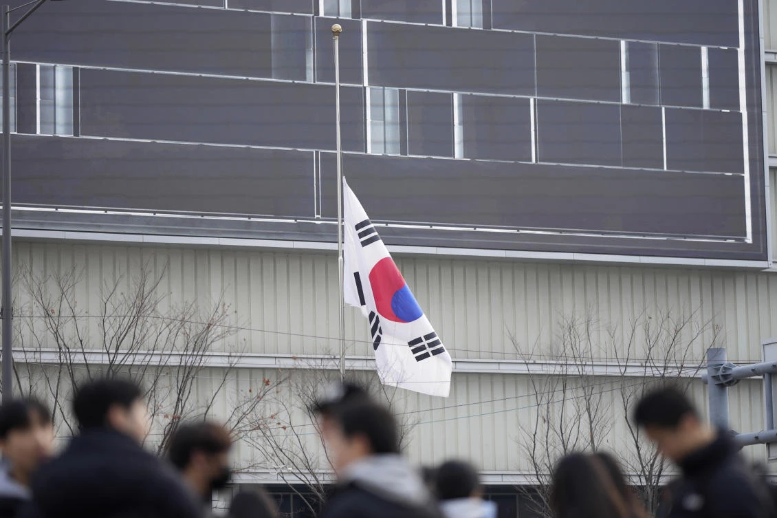 Flags flew at half-mast on Monday as South Korea mourned 179 people killed in the worst plane crash on its soil. (AP)