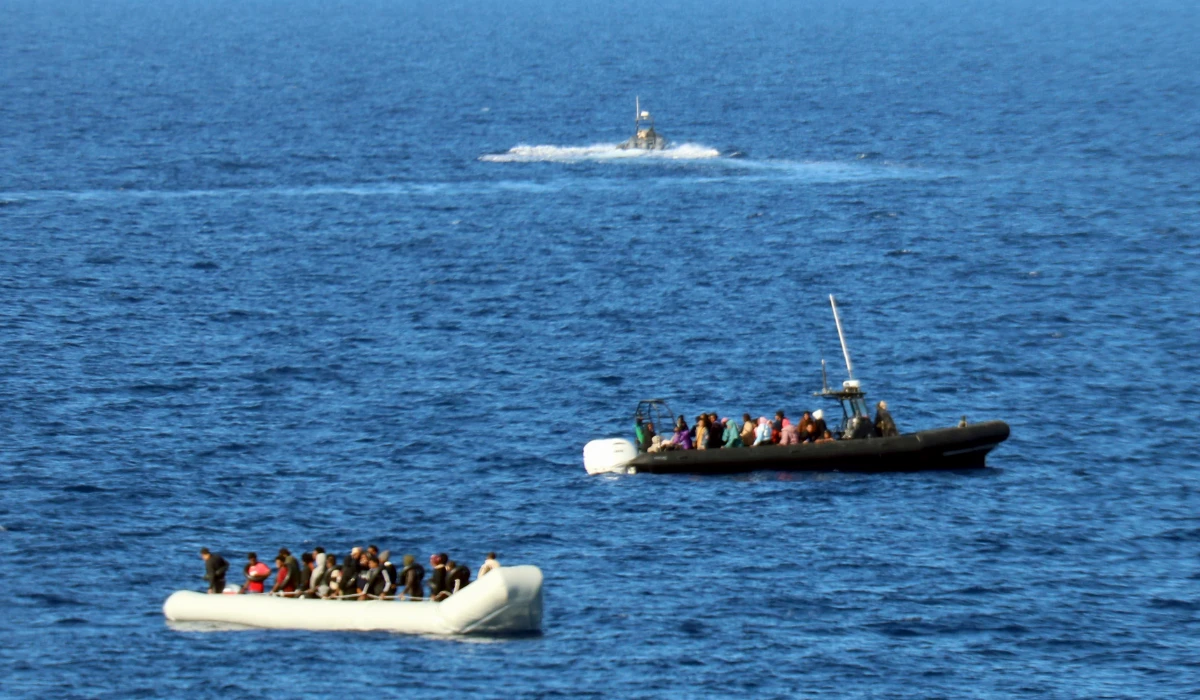 Migrants are seen on board of boats during a rescue operation in the Mediterranean Sea by MSF. (AP)