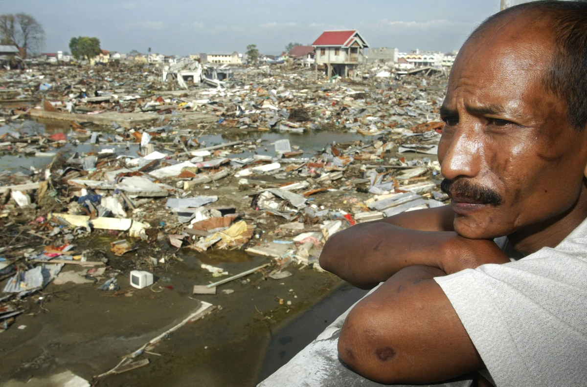 A man looks at destruction in Keudah village in the provincial capital of Banda Aceh, Indonesia, on Feb. 7, 2005. (AP/File)
