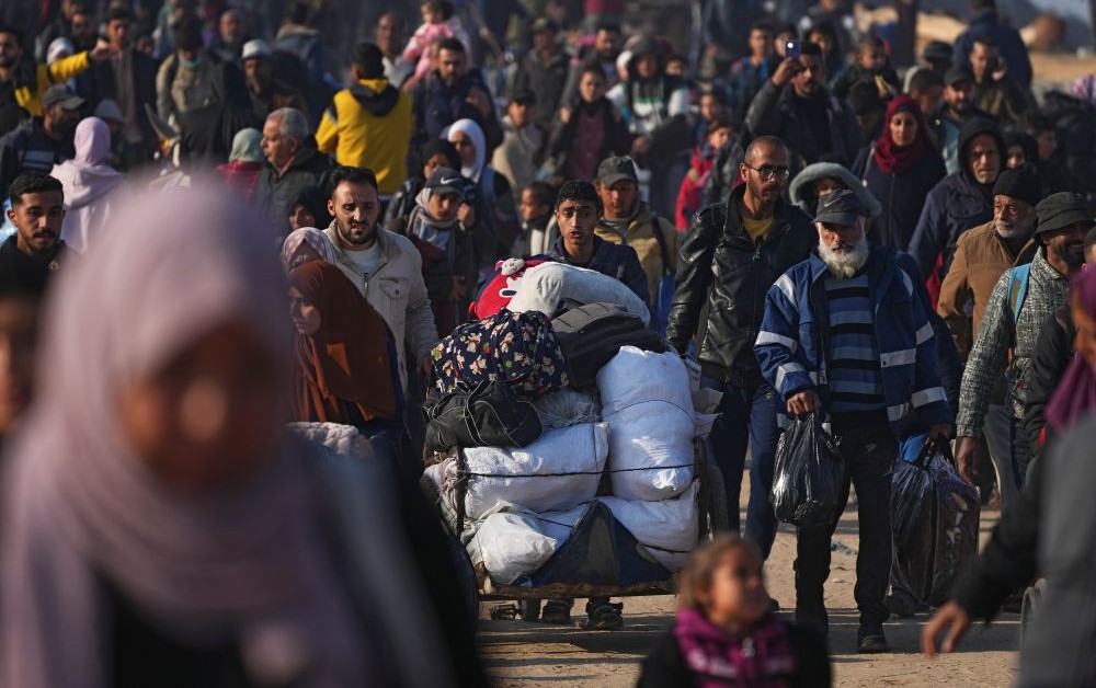Displaced Palestinians return to their homes in the northern Gaza Strip, Jan. 28, 2025. (AP Photo)