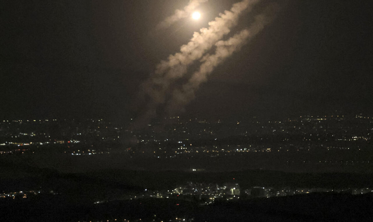 This picture taken from the West Bank city of Hebron shows projectiles above the Israeli city of Ashdod on October 1, 2024. (AFP)