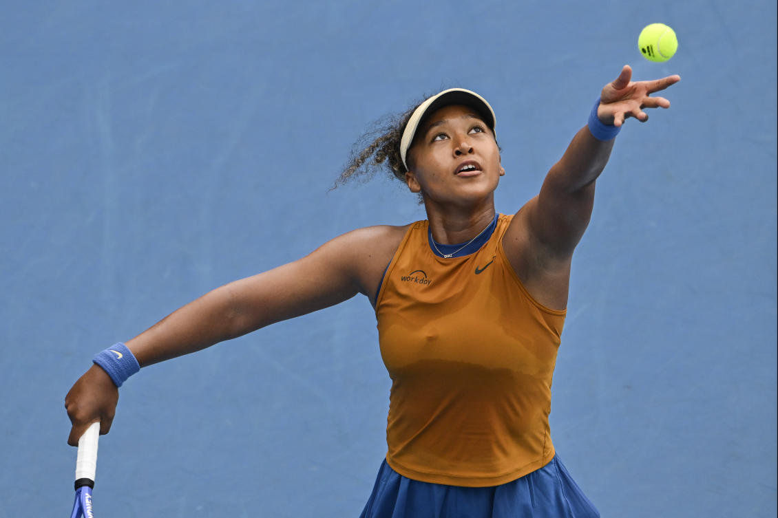 Osaka overcame a swirling breeze and a lengthy rain break to progress comfortably. (AP)