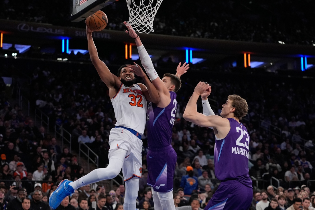 New York Knicks' Karl-Anthony Towns (32) shoots over Utah Jazz's Walker Kessler and Lauri Markkanen (23) during the second half of an NBA basketball game Wednesday in New York. (AP)