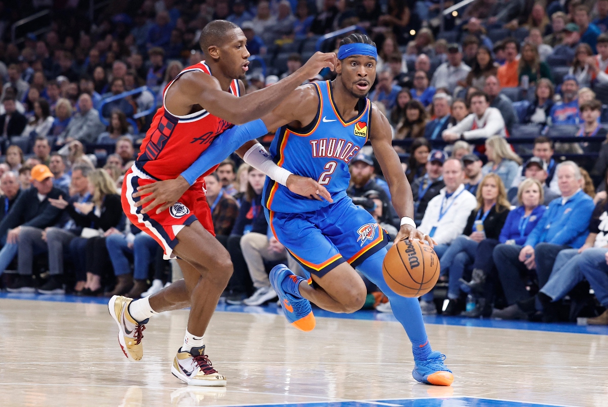 Oklahoma City Thunder guard Shai Gilgeous-Alexander drives to the basket around Los Angeles Clippers guard Kris Dunn during the second quarter of an NBA basketball game at Paycom Center Thursday. (USA