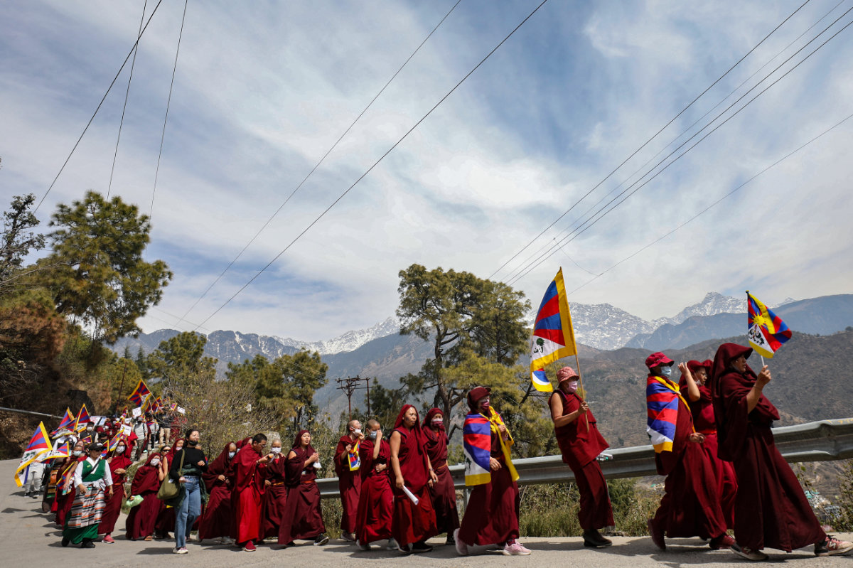 Tibetans living in exile in India attend a peace march during the 65th Tibetan National Uprising Day against the Chinese occupation of Tibet, in the suburb of McLeod Ganj near Dharamsala on March 10, 2024. (AFP file photo)