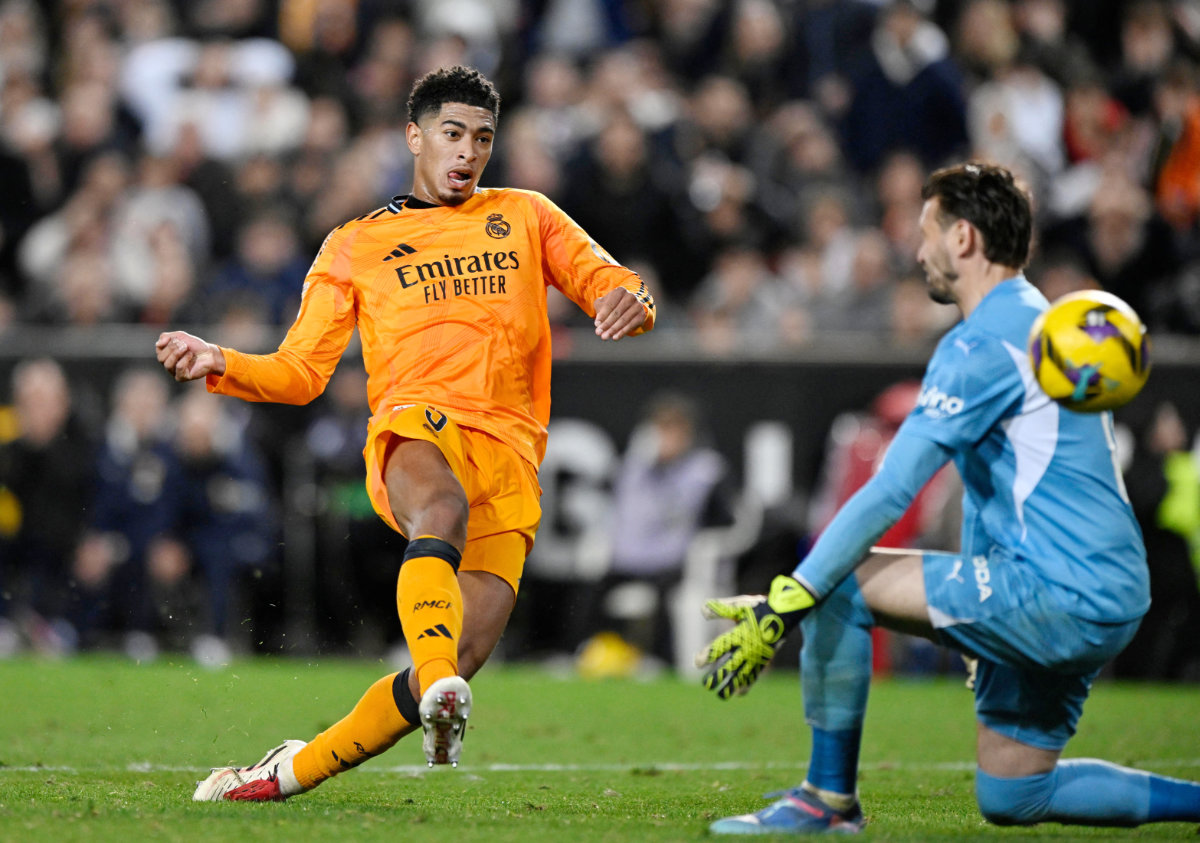 Real Madrid’s Jude Bellingham scores their second goal during the La Liga match between Valencia and Real Madrid at Estadio de Mestalla, Valencia, on Jan. 3, 2025. (Reuters)