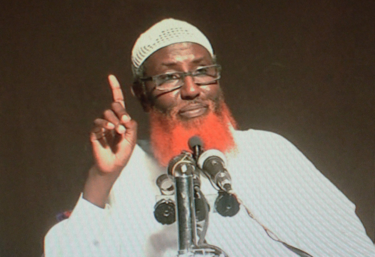 This picture taken on September 1, 2016, in Nairobi, Kenya, shows a computer screen displaying the portrait of Somali-born cleric Abdulqadir Mumin, accused of heading the Daesh group in East Africa. (AFP)