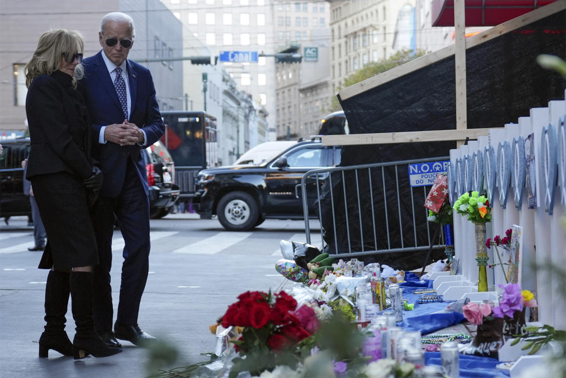 Biden visits makeshift memorial in New Orleans where attack began that killed 14 and injured 30