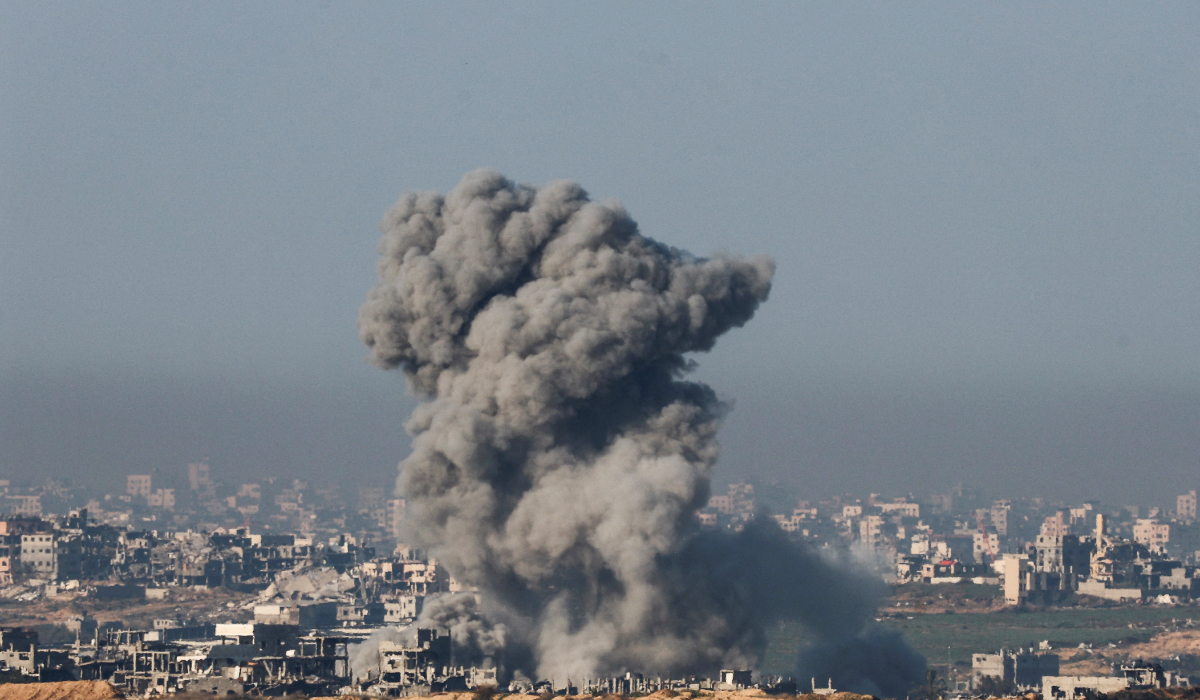 Smoke billows as buildings lie in ruin in Beit Hanoun in the Gaza Strip, amid the ongoing conflict between Israel and Hamas, as seen from southern Israel, January 7, 2025. (REUTERS)