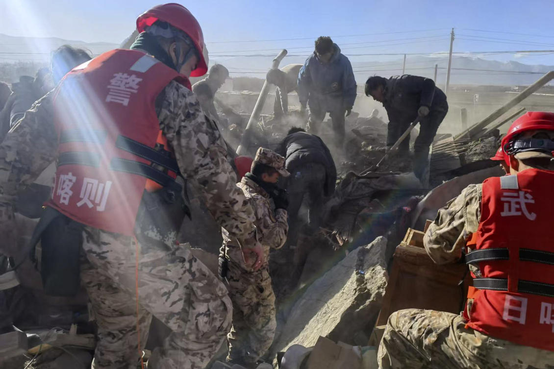 In this photo released by Xinhua News Agency, rescue workers conduct search and rescue for survivors in the aftermath of an earthquake in Changsuo Township of Dingri in Xigaze, southwestern China’s Tibet Autonomous Region on Tuesday. (AP)