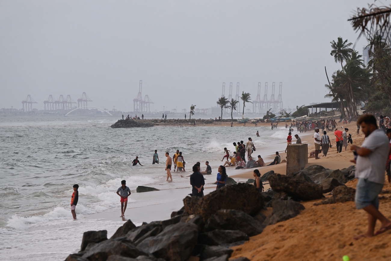 People enjoy the beach in Colombo, Sri Lanka. (File/AFP)