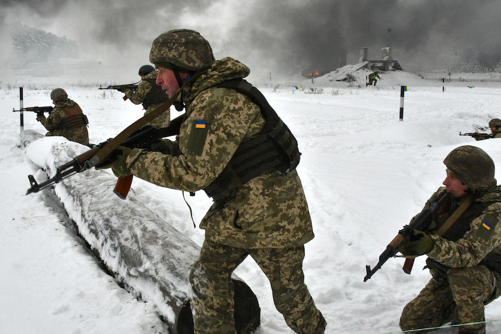 Kyiv’s mobilization campaign has spurred panic among Ukrainian fighting-aged men and has seen thousands flee the country illegally toward Europe. Above, army reservists take part in exercises near the village of Desna, Chernigiv region, on Dec. 19, 2018. (AFP)
