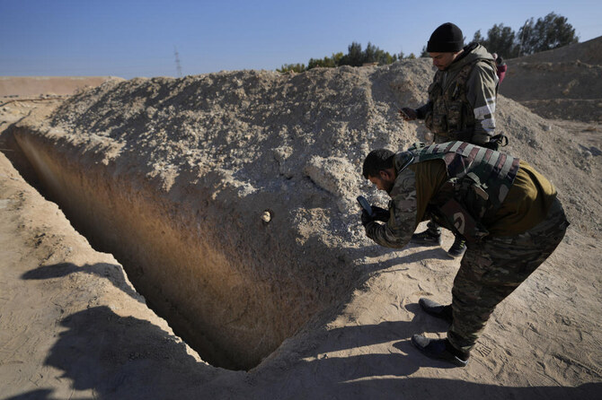 A Syria monitor said fighters linked to the Islamist-led transitional administration publicly executed a local official on Friday, accusing him of having been an informant under ousted strongman Bashar Assad. (AP/File)