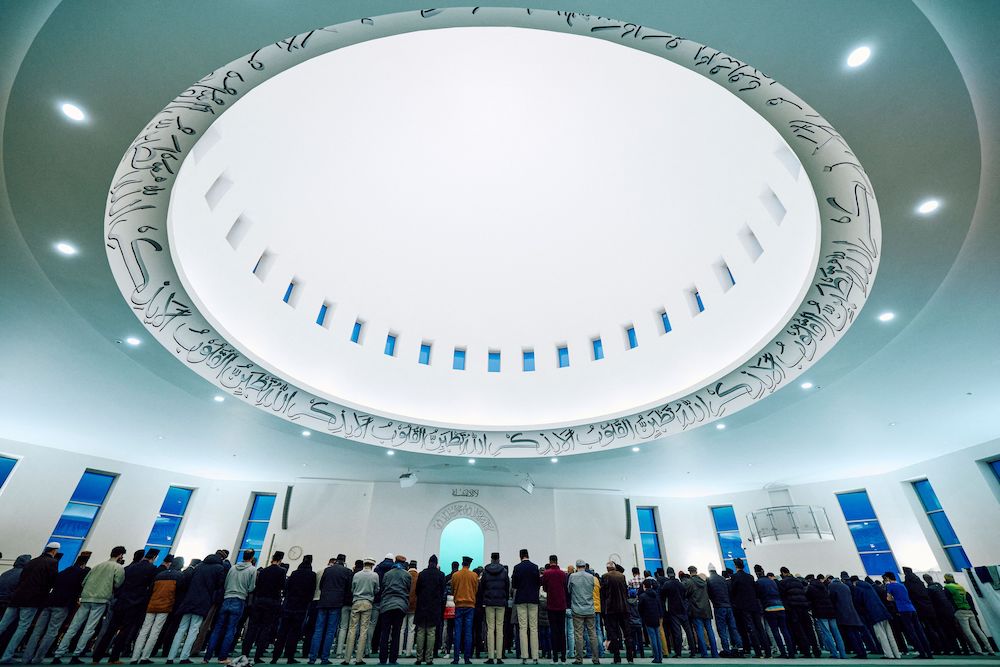 Above, members of the Ahmadiyya Muslim Community pray at the Baitul Futuh Mosque in Morden, southwest London on March 30, 2024. (AFP file photo)