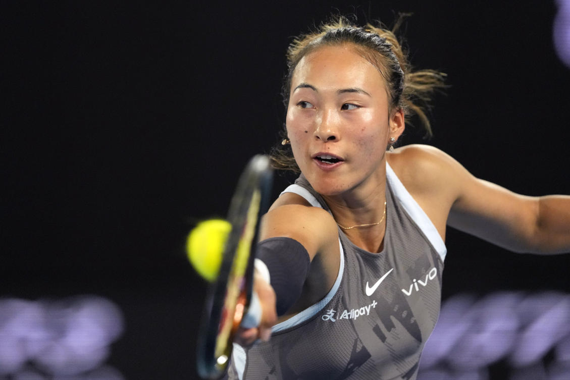 It was one of the matches that continued under cover when tournament organizers suspended play on all outside courts until later in the afternoon. (AP)